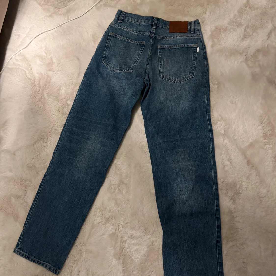 Woodbird ljusblå raka jeans 28/32