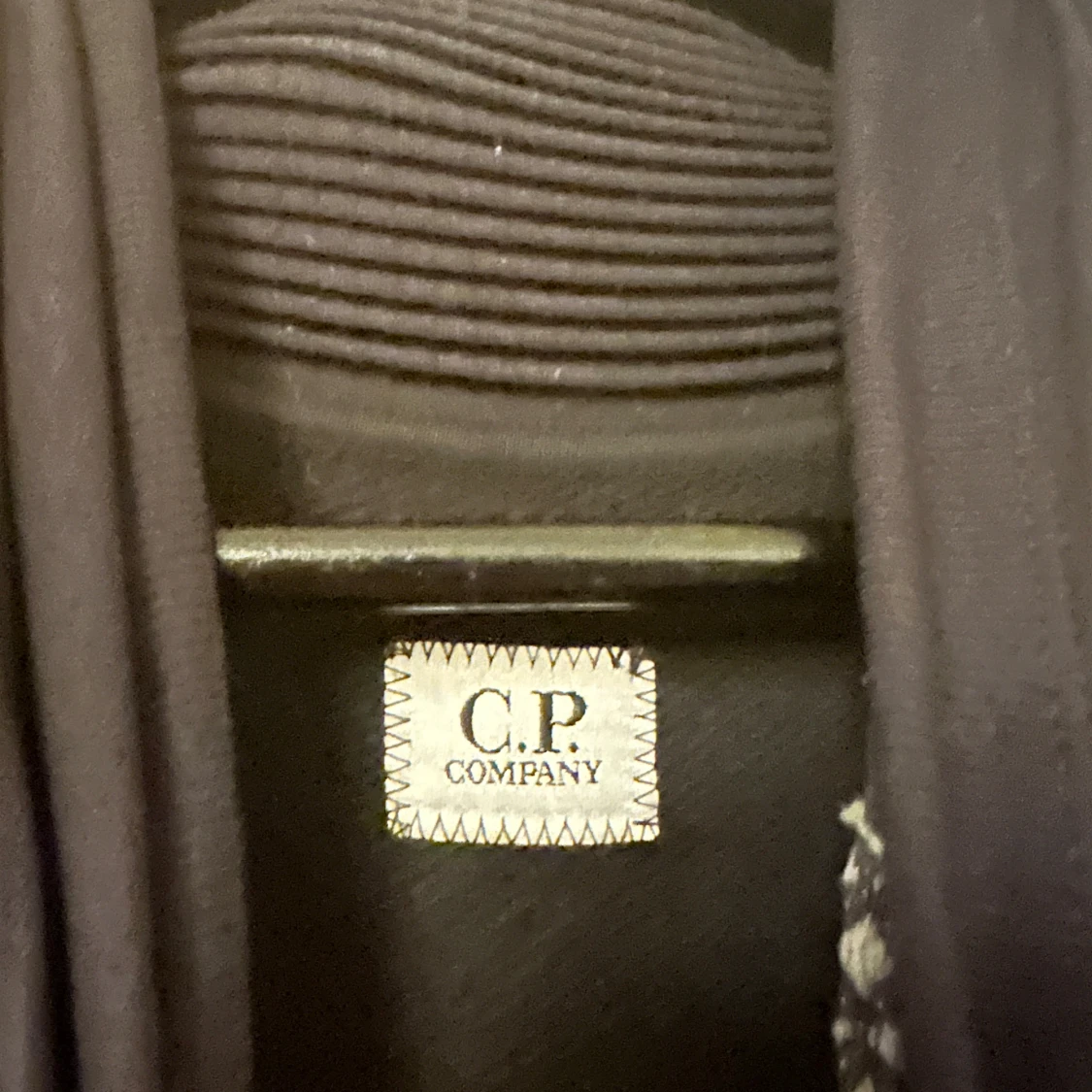 Svart polotröja från C.P. Company - 2