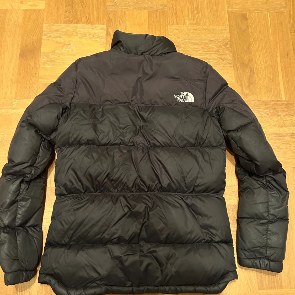Svart pufferjacka från The North Face XS - 1
