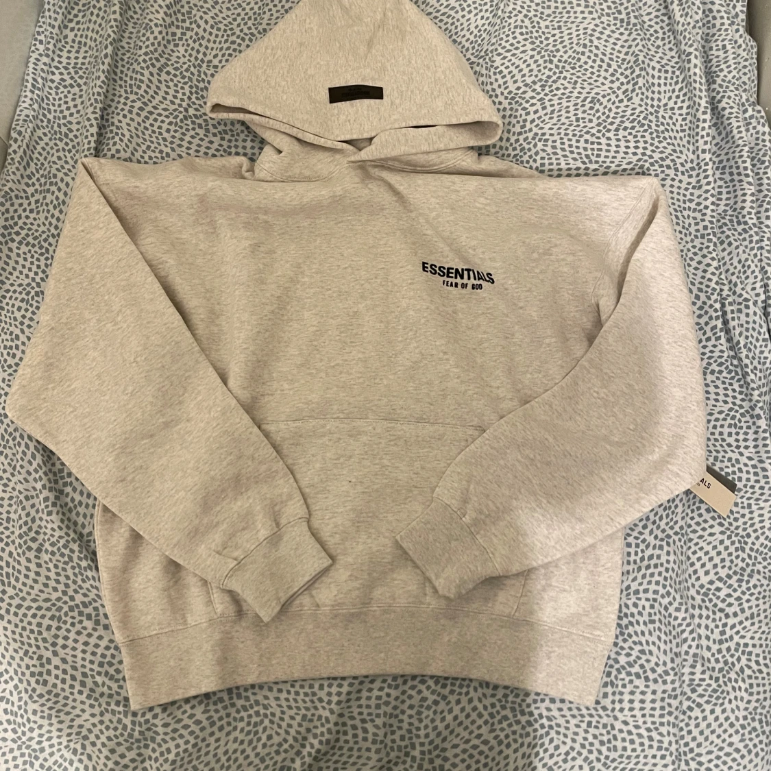 Ljusgrå Essentials Fear of God hoodie