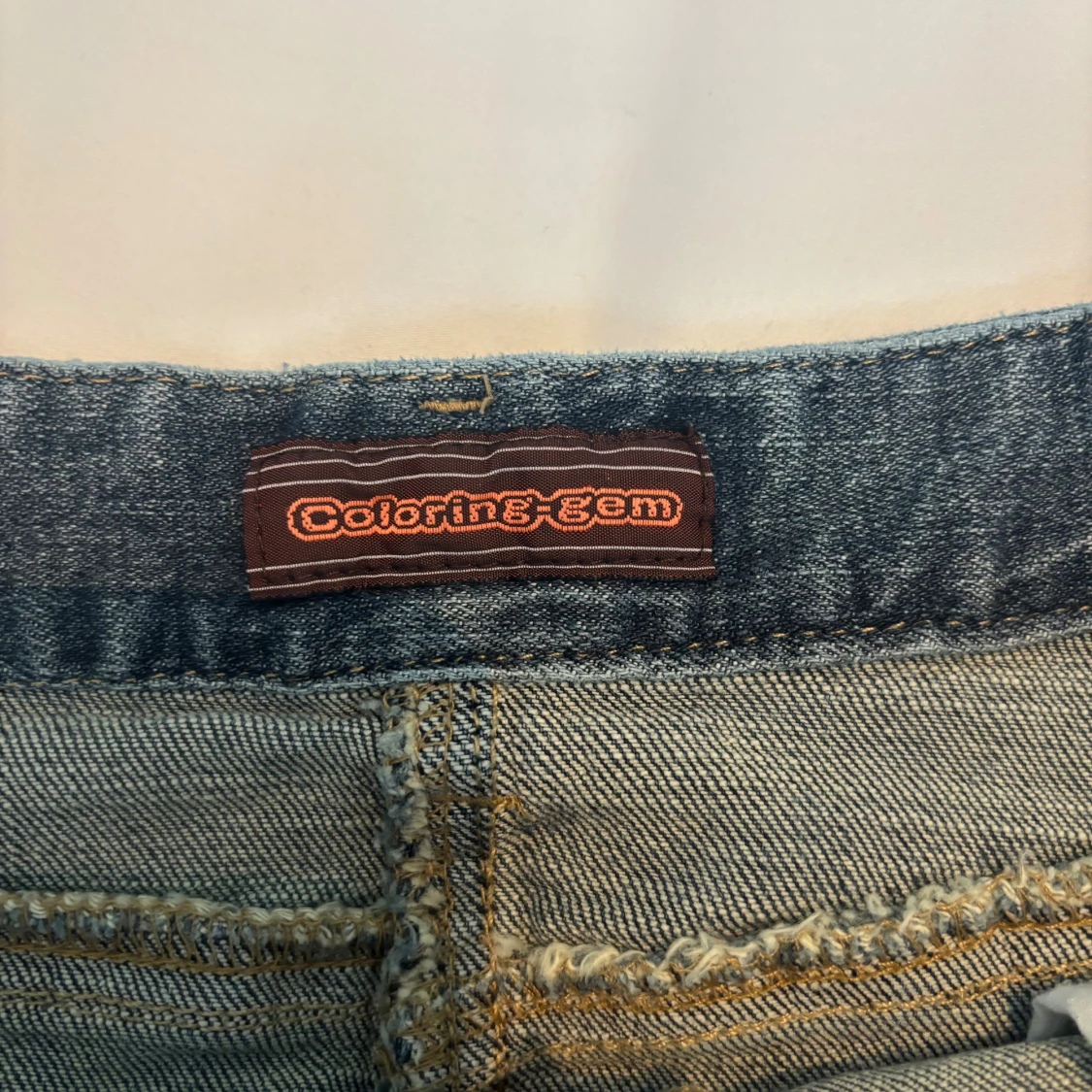 Blå jeanskjol med slitningar Coloring-gem - 2