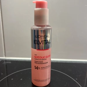 L'Oréal Elvital Glycolic Gloss Serum - L'Oréal Elvital Glycolic Gloss Leave-In Serum. För glans och mjukhet. Ca 80% kvar av flaskan