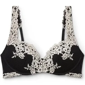 Intimissimi BH - Supersnygg svart bandeau–topp från Intimissimi med vit spets i blommigt mönster. Toppen har tunna axelband och en elegant, romantisk vibe. Perfekt att styla under en kavaj eller till höga jeans för en trendig look.