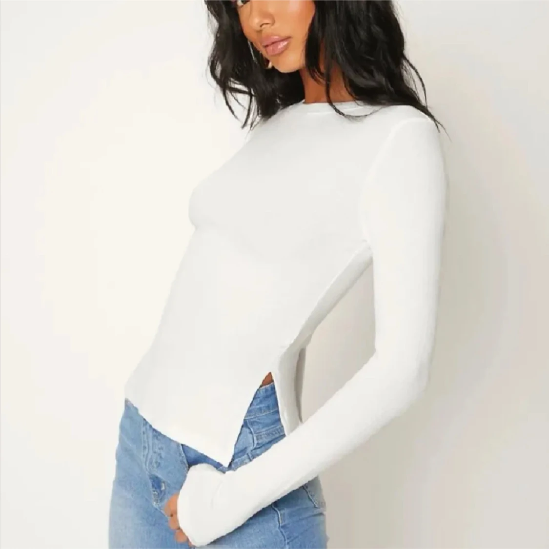 Vit långärmad topp med slits