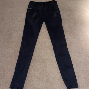 Replay svarta anbass  - Anbass hyperflex i storlek W30 L32                                 