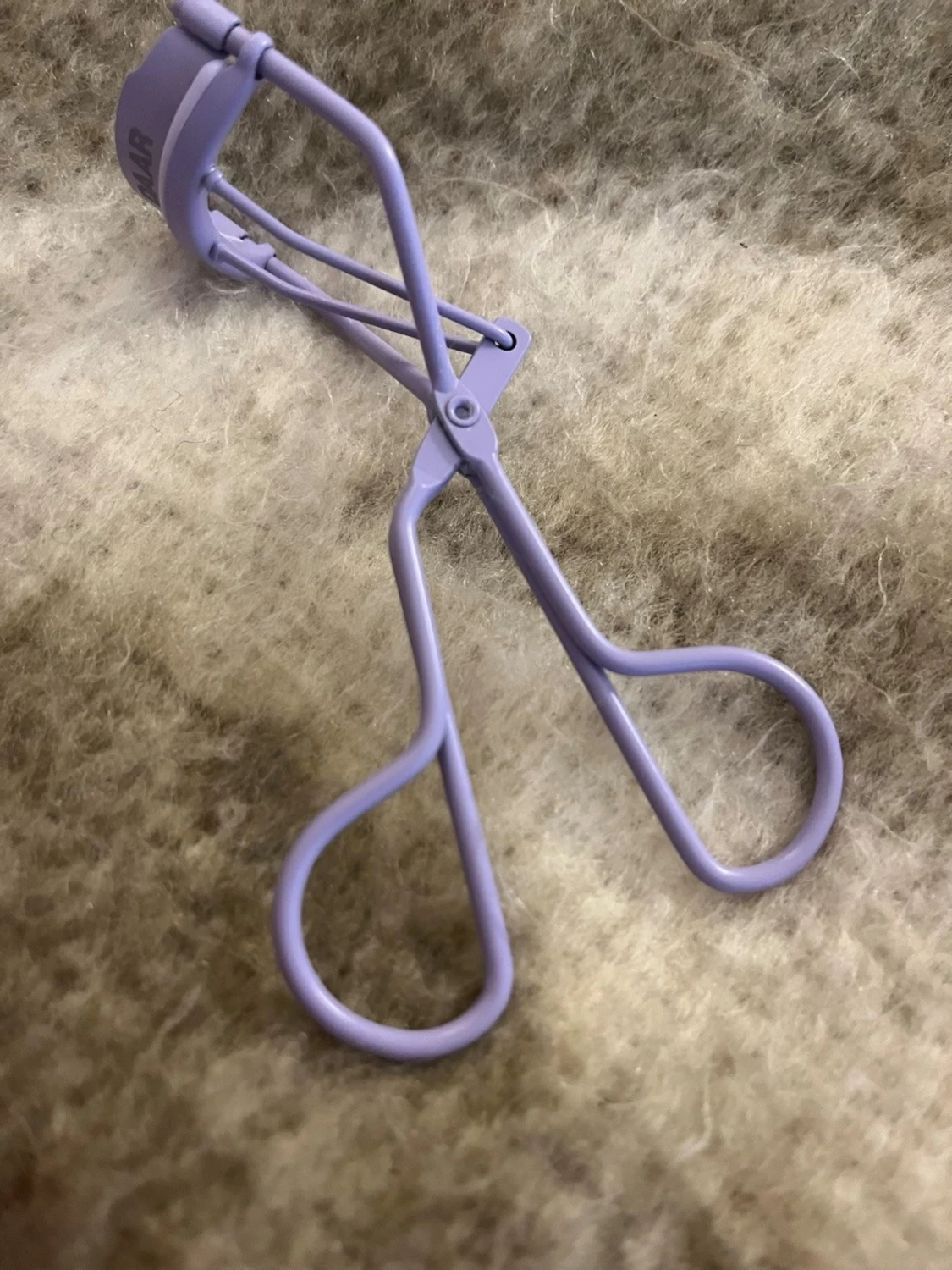 Ljuslila ögonfransböjare från DAAR - 3