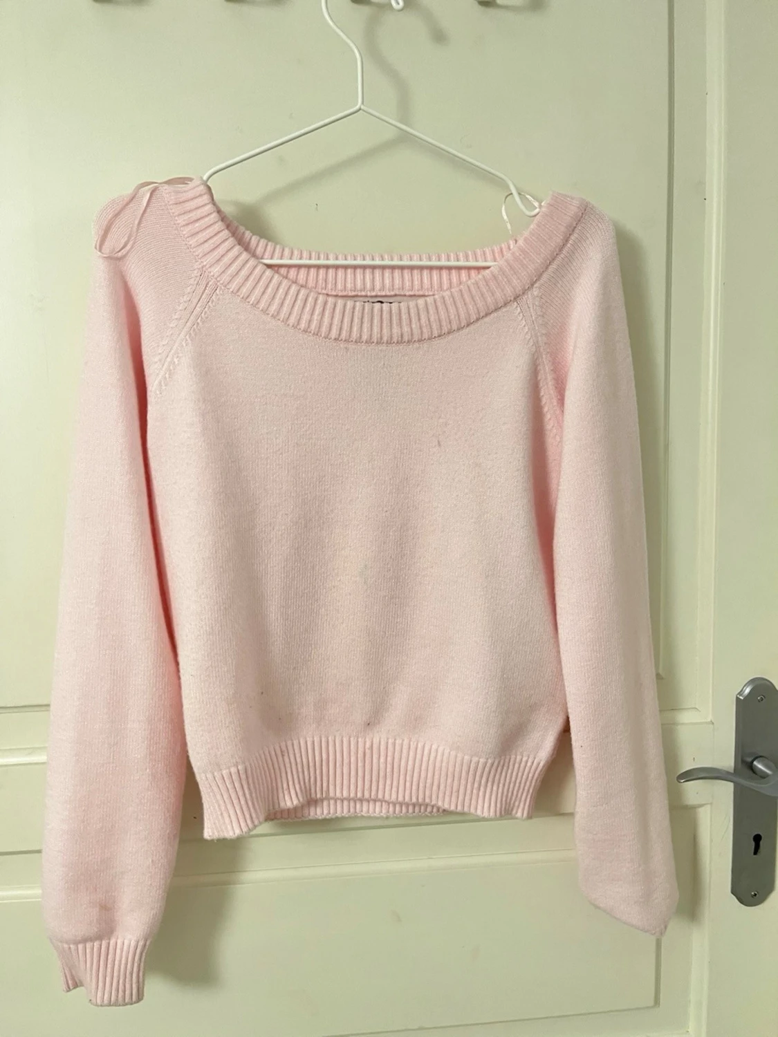 Ljusrosa stickad tröja med rund hals