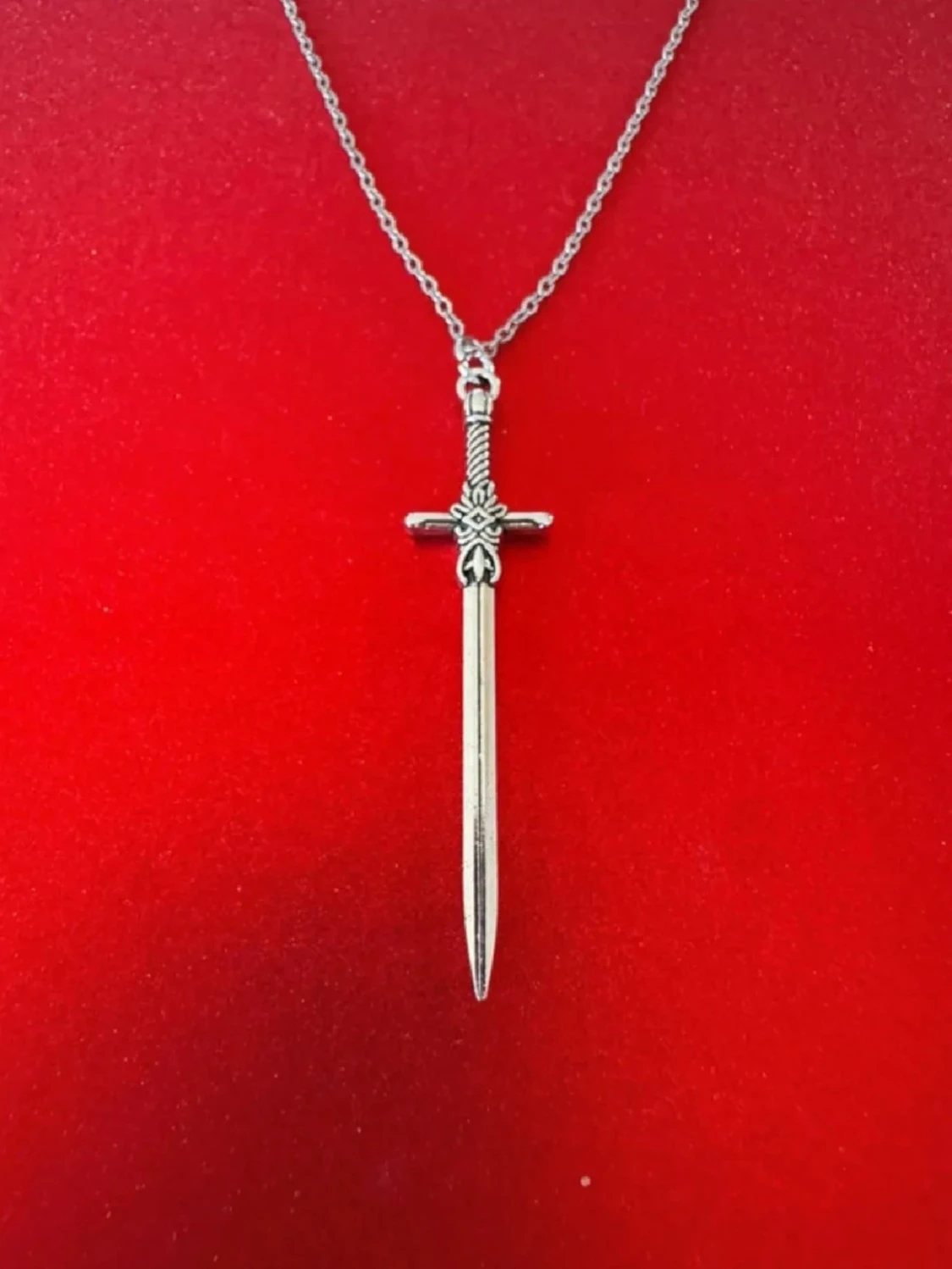 Silverhalsband svärd 