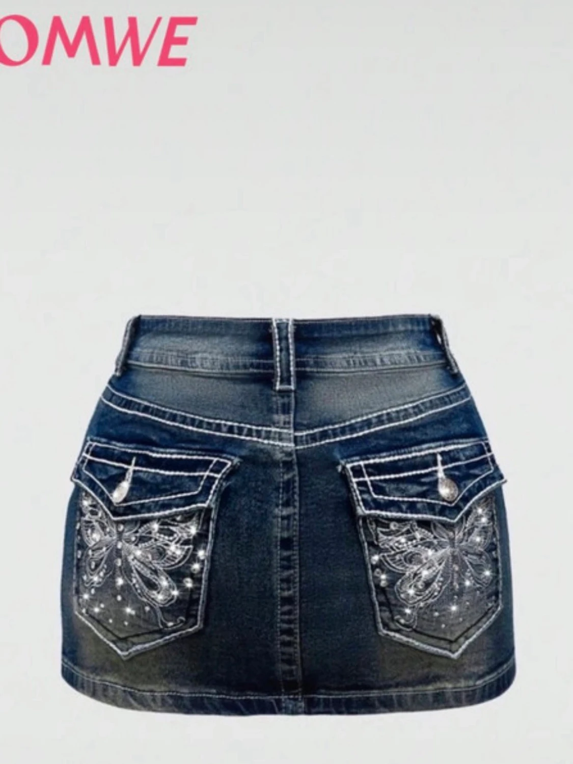 Blå jeanskjol med broderade fjärilar