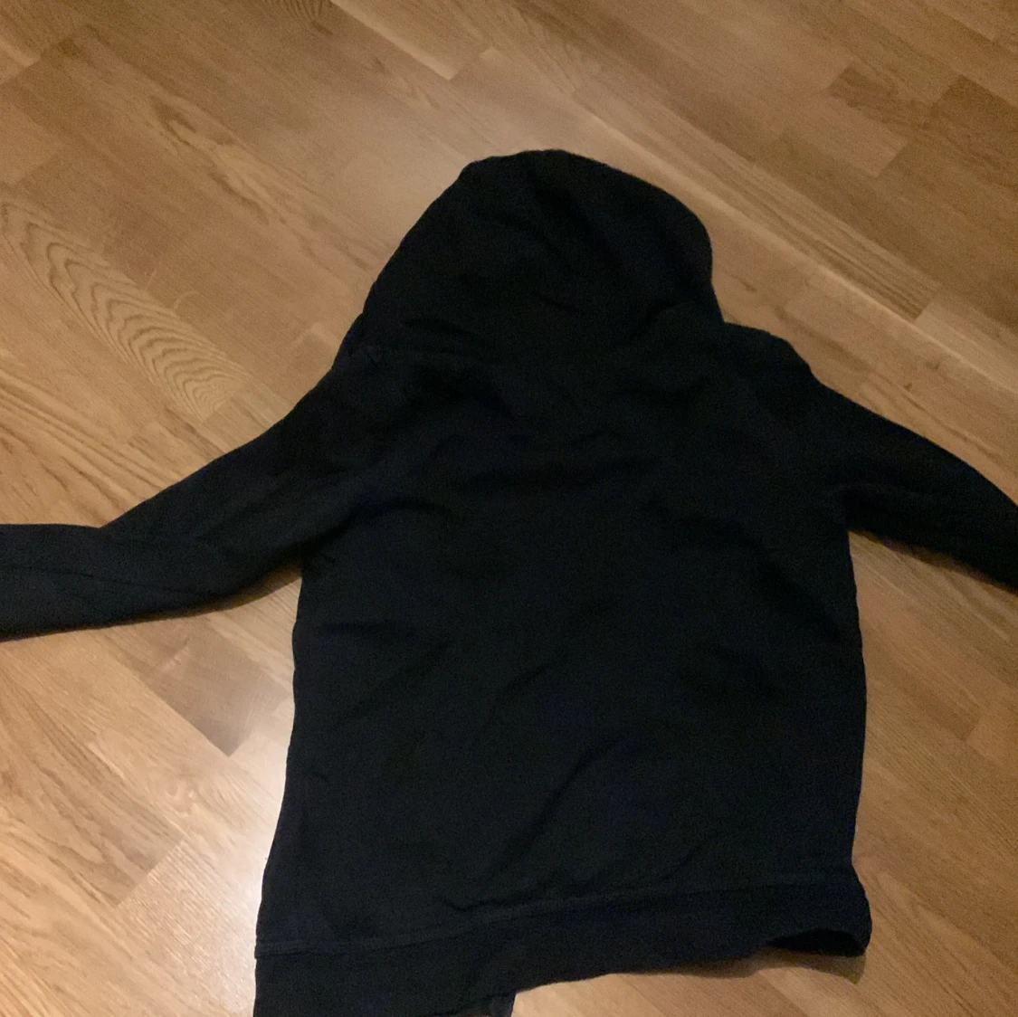 Svart hoodie från Nike med dragkedja - 1
