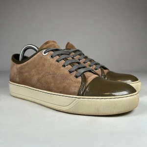 Lanvin skor - Säljer ett par snygga bruna lanvins! Strl 5/40-41. Skorna är i bra skick. Skriv om du har några funderingar 