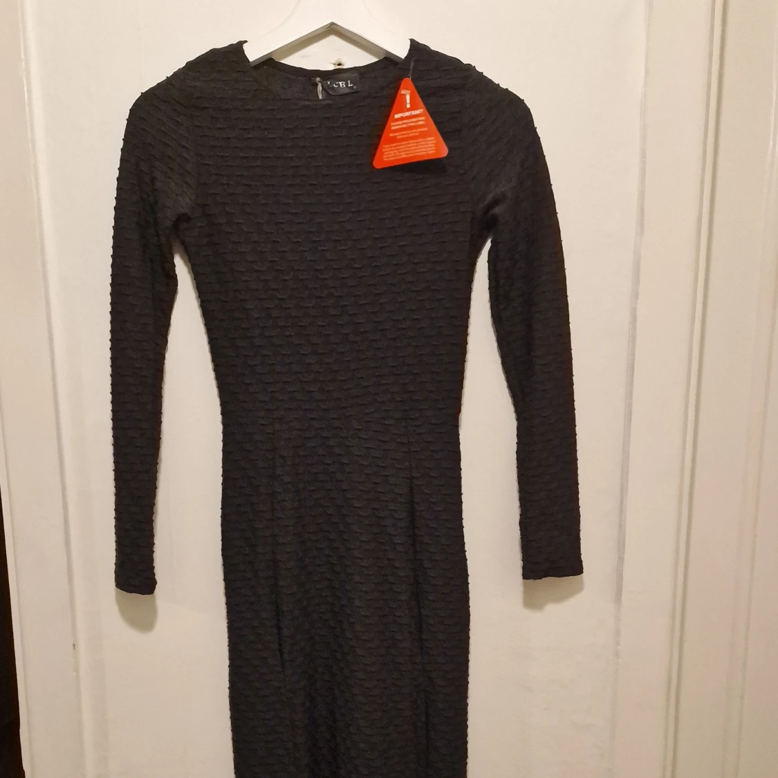 Svart långklänning