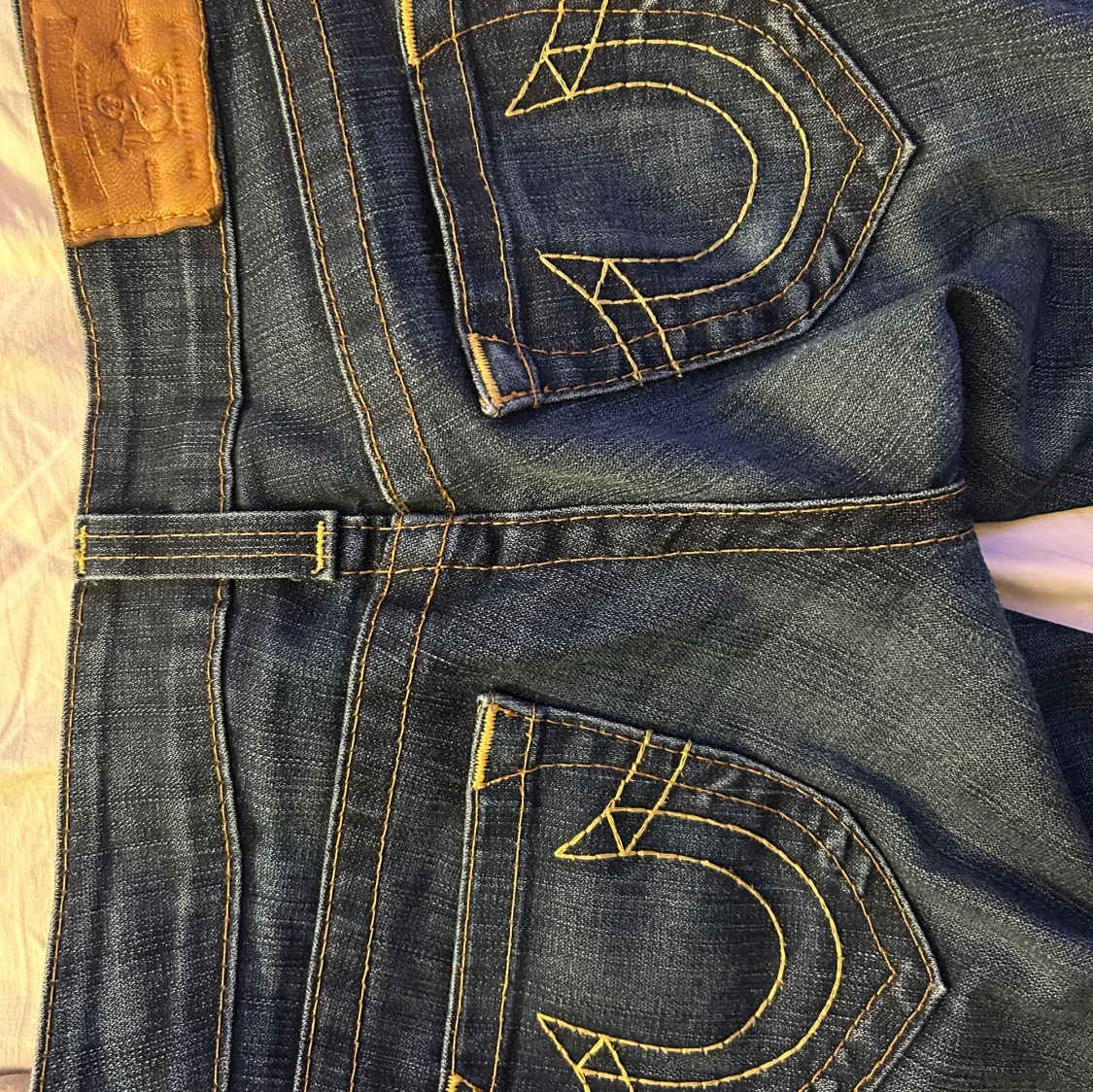 Bootcut true religon jeans.