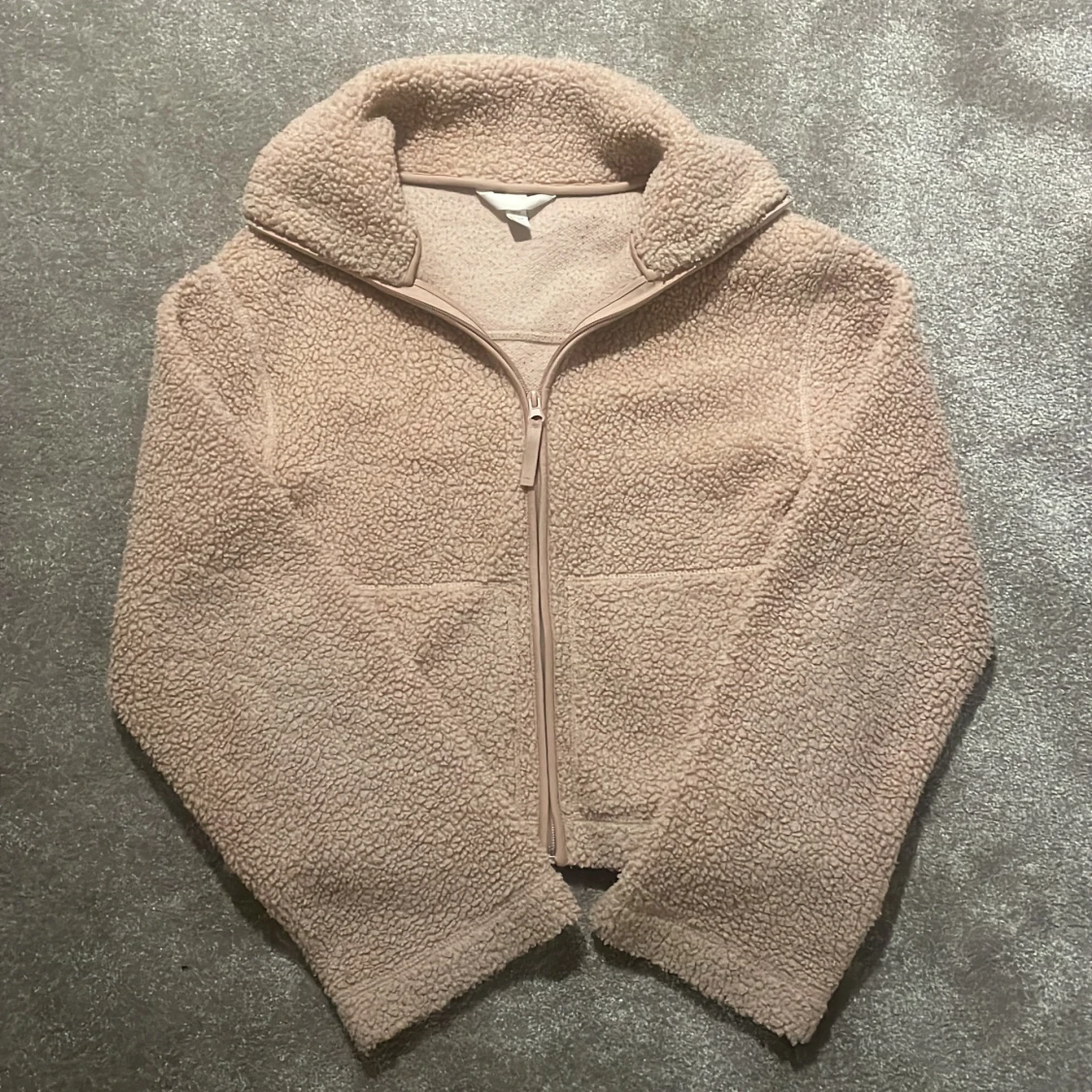 Beige teddyjacka från H&M