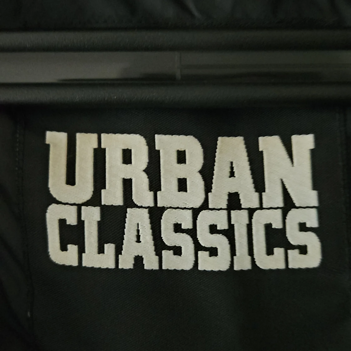 Svart väst strl L - 1