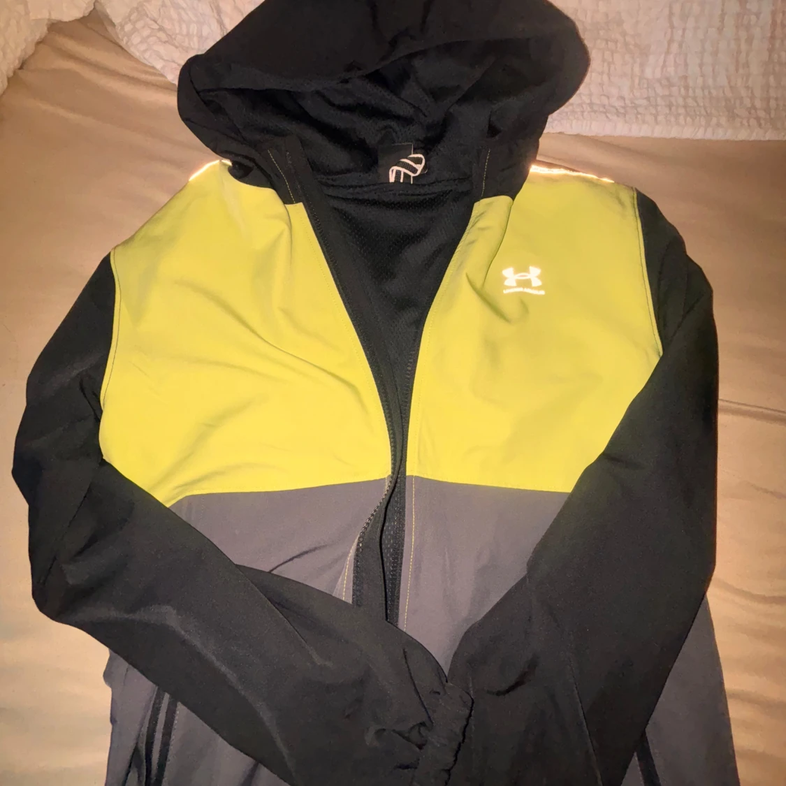 Under Armour vindjacka 