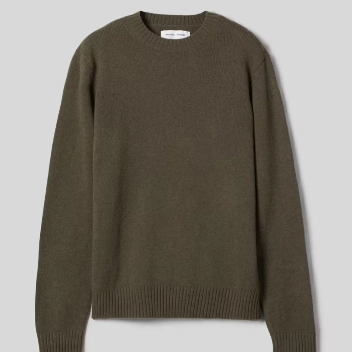 Olivgrön stickad tröja med rund hals