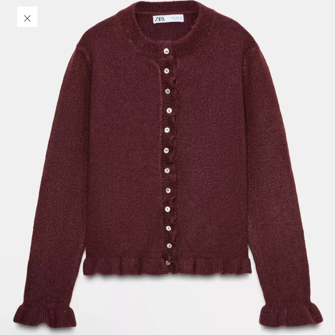 Vinröd kofta från Zara med volang