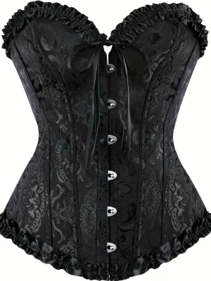 Svart korsettväst med snörning - Säljer en svart korsettväst med snyggt mönstrad yta, volangkant och dekorativ rosett framtill. Västen har knappar framtill och snörning i ryggen för justerbar passform. Ha använt en gång!