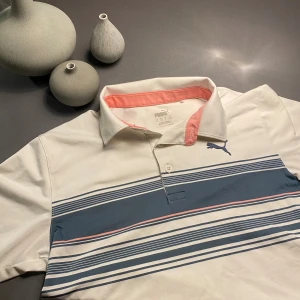 Golf Piké  - Säljer nu denna riktigt snygga golf piken från Puma i st Xs bara höra av dig frågor eller funderingar!