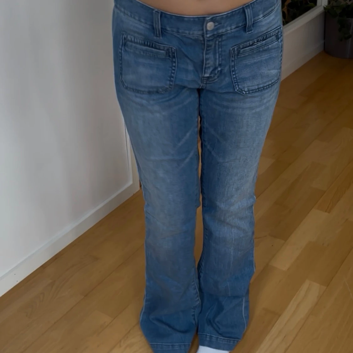 Blå bootcut jeans från Tommy Hilfiger