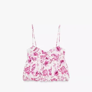 Blommig vit och rosa linnetopp från Zara - Supersöt linnetopp från Zara med tunna axelband och blommigt mönster i rosa och vitt. Säljs då den inte passar