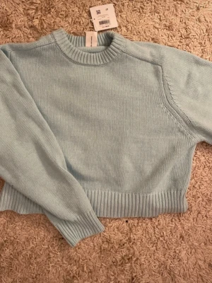 Lightblue knitted sweater  - Selling because it doesn’t fit me, really beautiful!! 