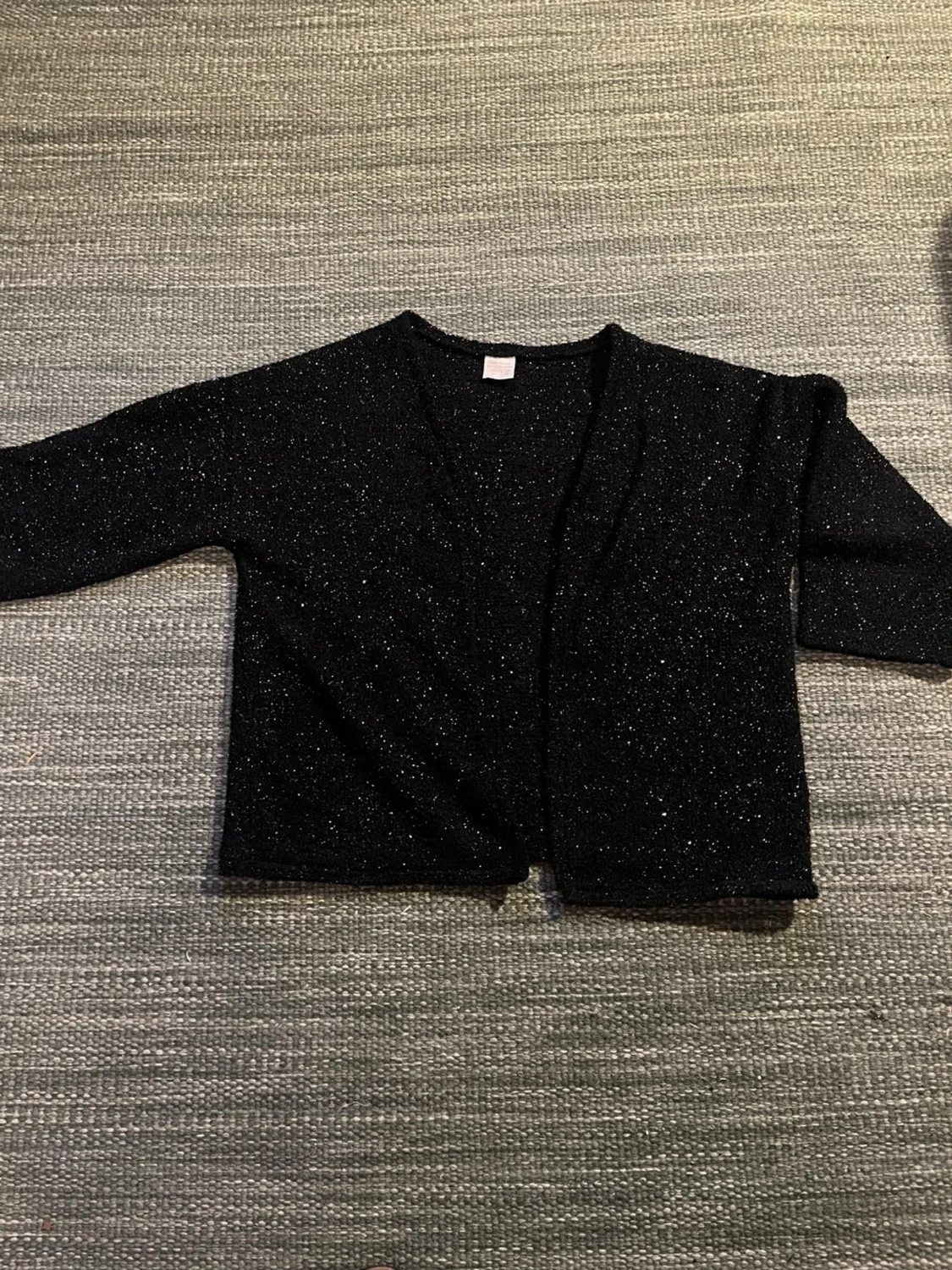 Glittrig svart kofta från Zara Girls
