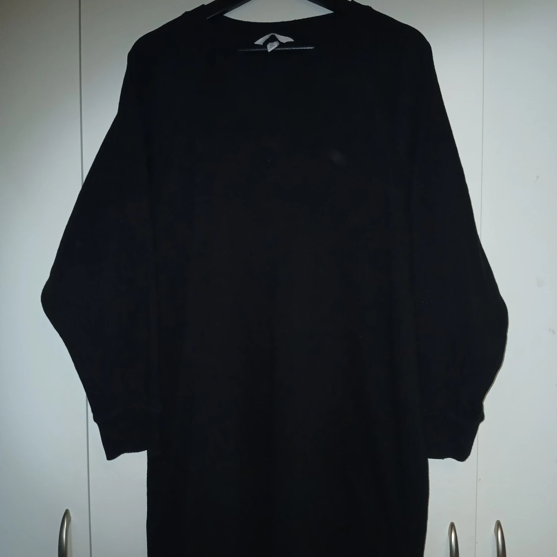 Svart långärmad klänning