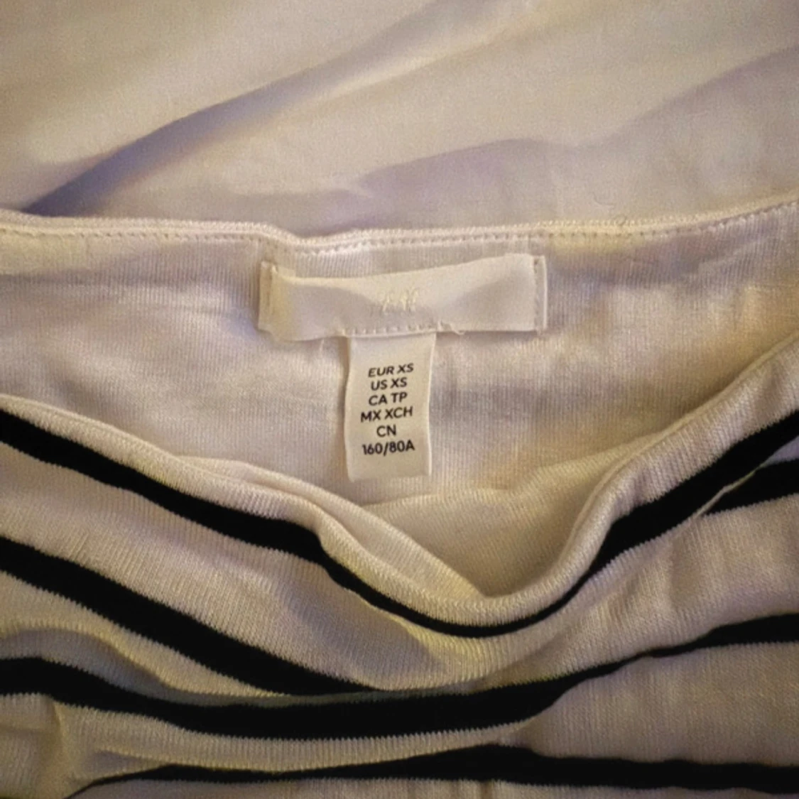 Randig långärmad body från H&M XS - 1