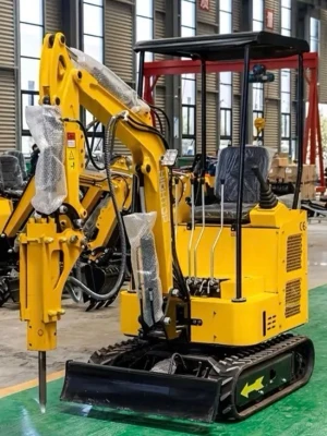 Gul minigrävare med hydraulhammare  - Kraftfull gul minigrävare med hydraulhammare och larvfötter. Maskinen har öppen hytt, flera spakar för styrning och robust stålkonstruktion. Perfekt för bygg- och rivningsprojekt där smidighet och styrka krävs.betlas 