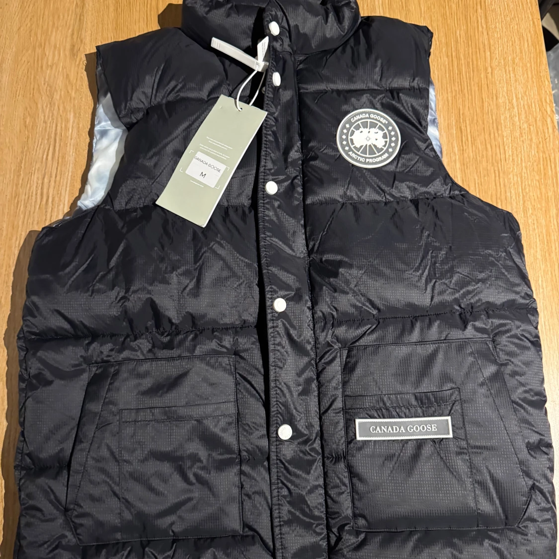 Svart dunväst från Canada Goose