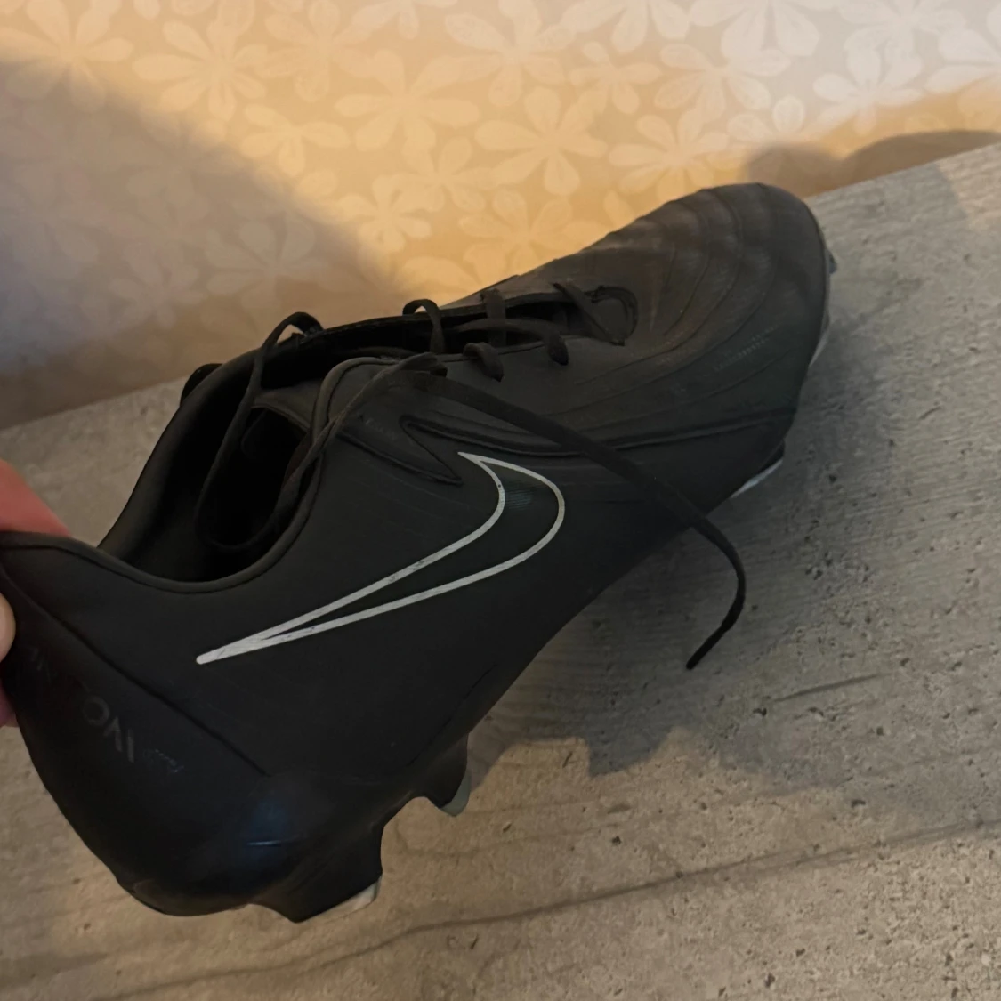 Svarta Nike fotbollsskor med dobbar