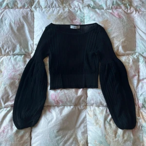 stickad topp - sparsamt använd 