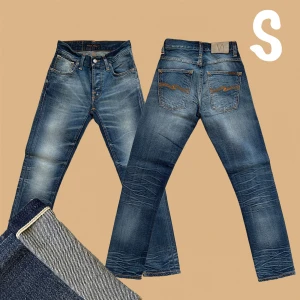 NUDIE JEANS GRIM TIM SELVEDGE - Tjena! Säljer dessa grymt feta Selvedge Nudie Grim Tim✔️ W27 L30 (W:34cm L:100cm)✔️Skriv vid fråga eller fundering✔️