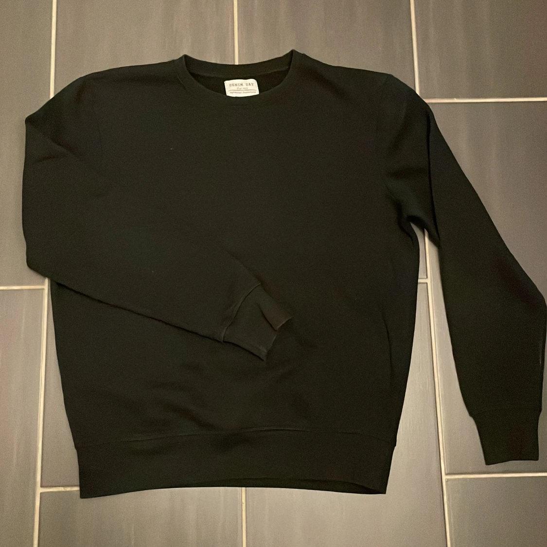 Svart sweatshirt från Denim Day