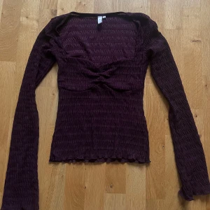 Nelly långärmad topp - Supersnygg Nelly topp  använd en gång bara😇😇