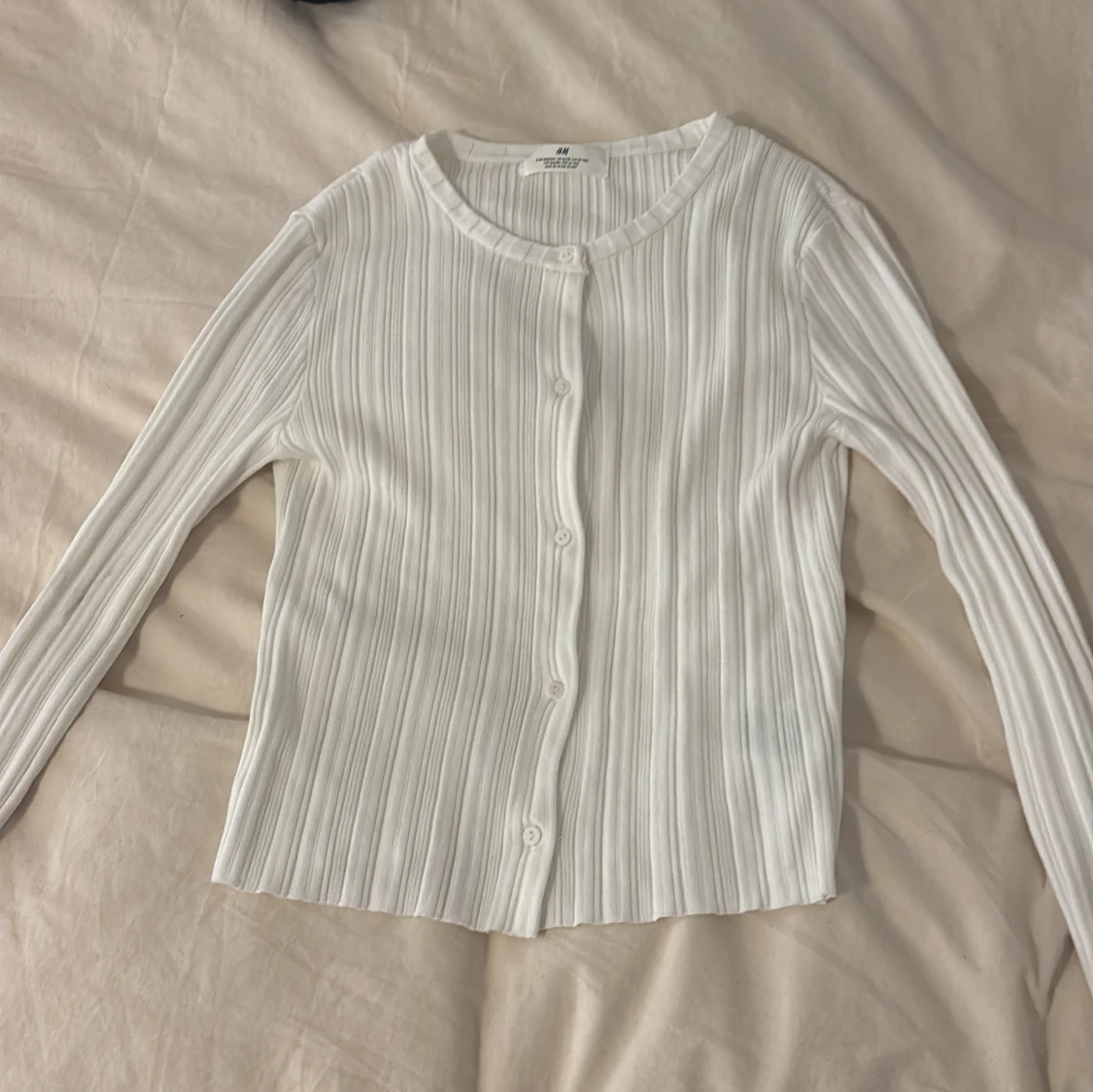 Vit ribbad kofta från H&M