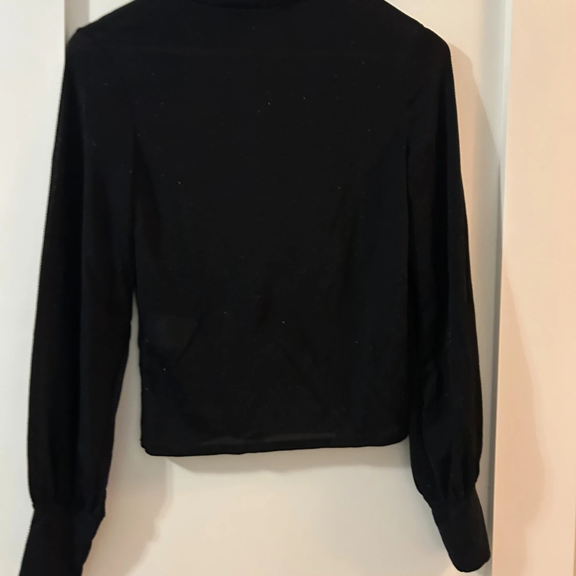 Svart glittrig polotopp - 1