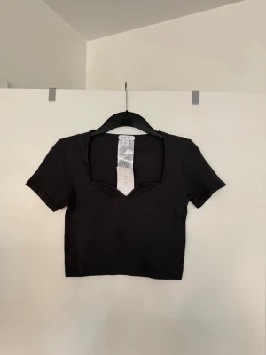 T-shirt grå  - Storlek L. Aldrig använd. 