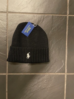 Ralph Lauren mössa  - Skick 10/10. Onesize fits all.
