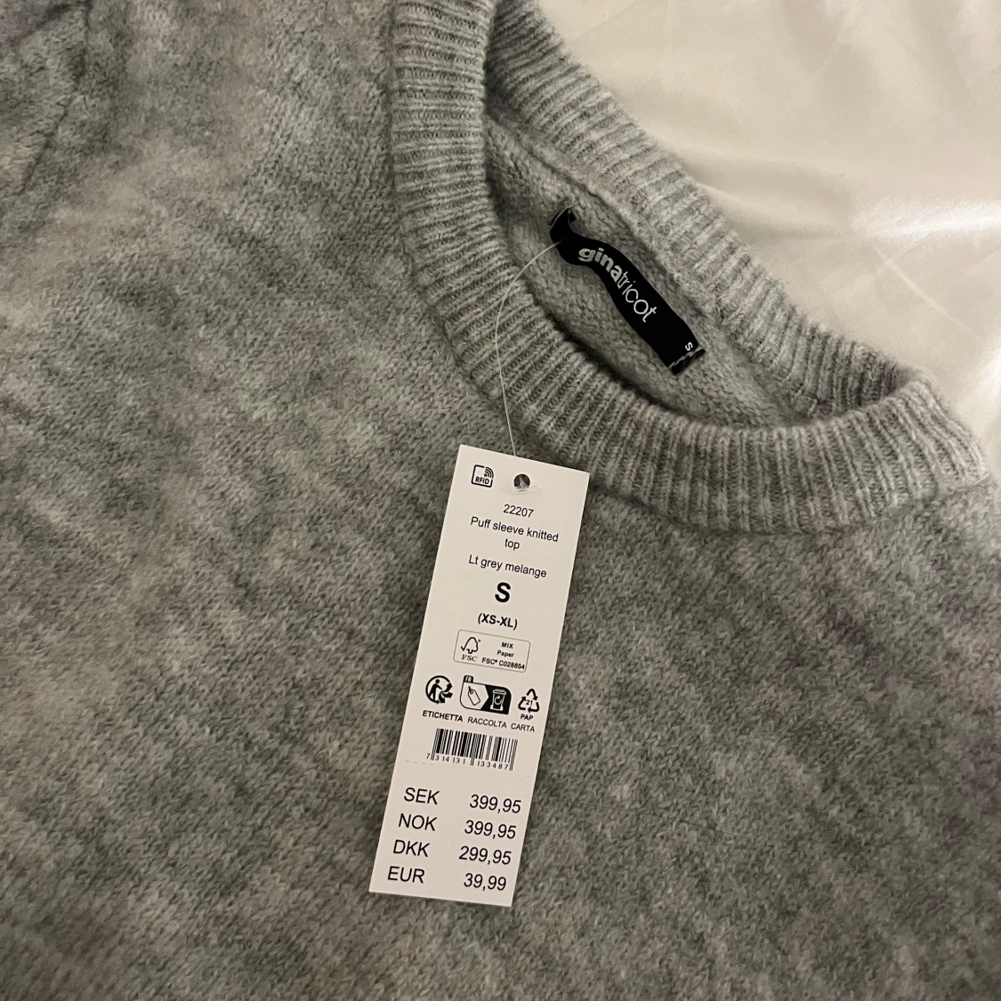 Grå stickad men balongarmar - 1