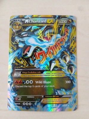 Pokémonkort Mega Charizard EX - Säljer ett samlarkort från Pokémon, Mega Charizard EX .