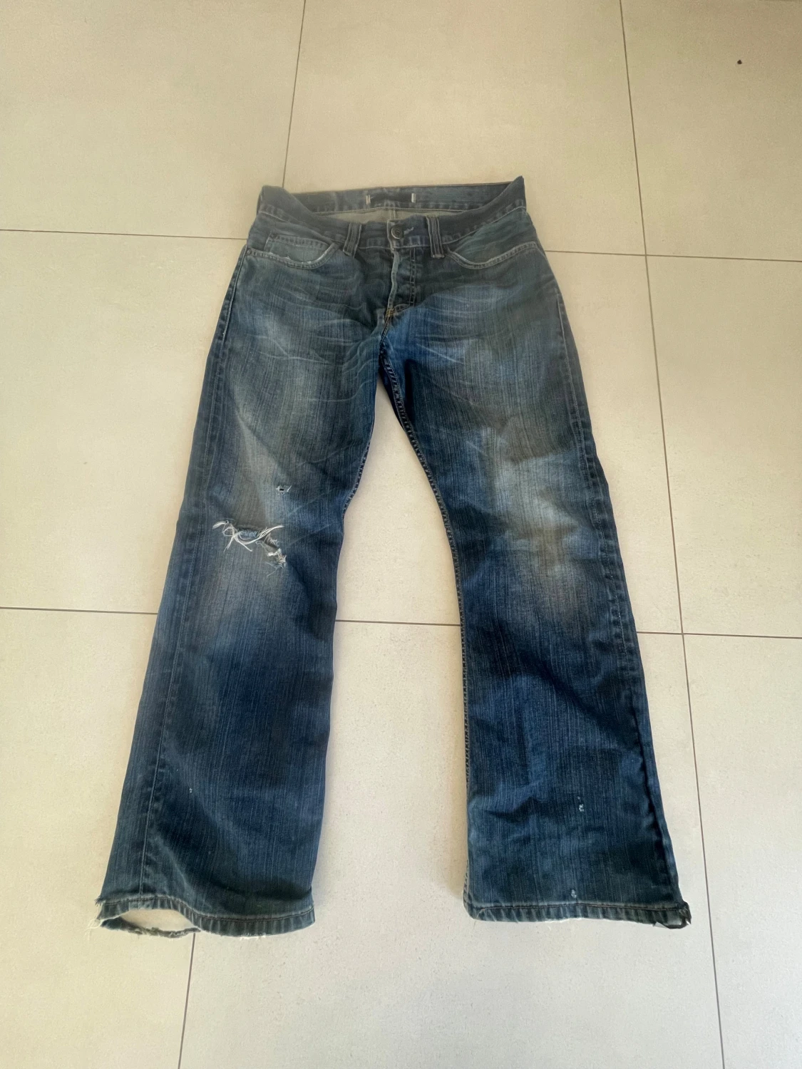 Levi's 502 blå jeans med slitningar