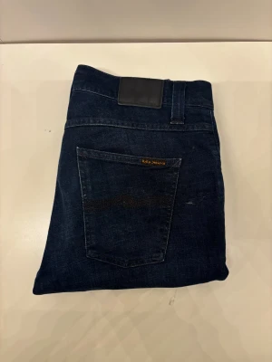 NUDIE jeans Lean Dean  - Riktigt bra skick, fet fade. Om du har någon fråga är det bara att skriva!