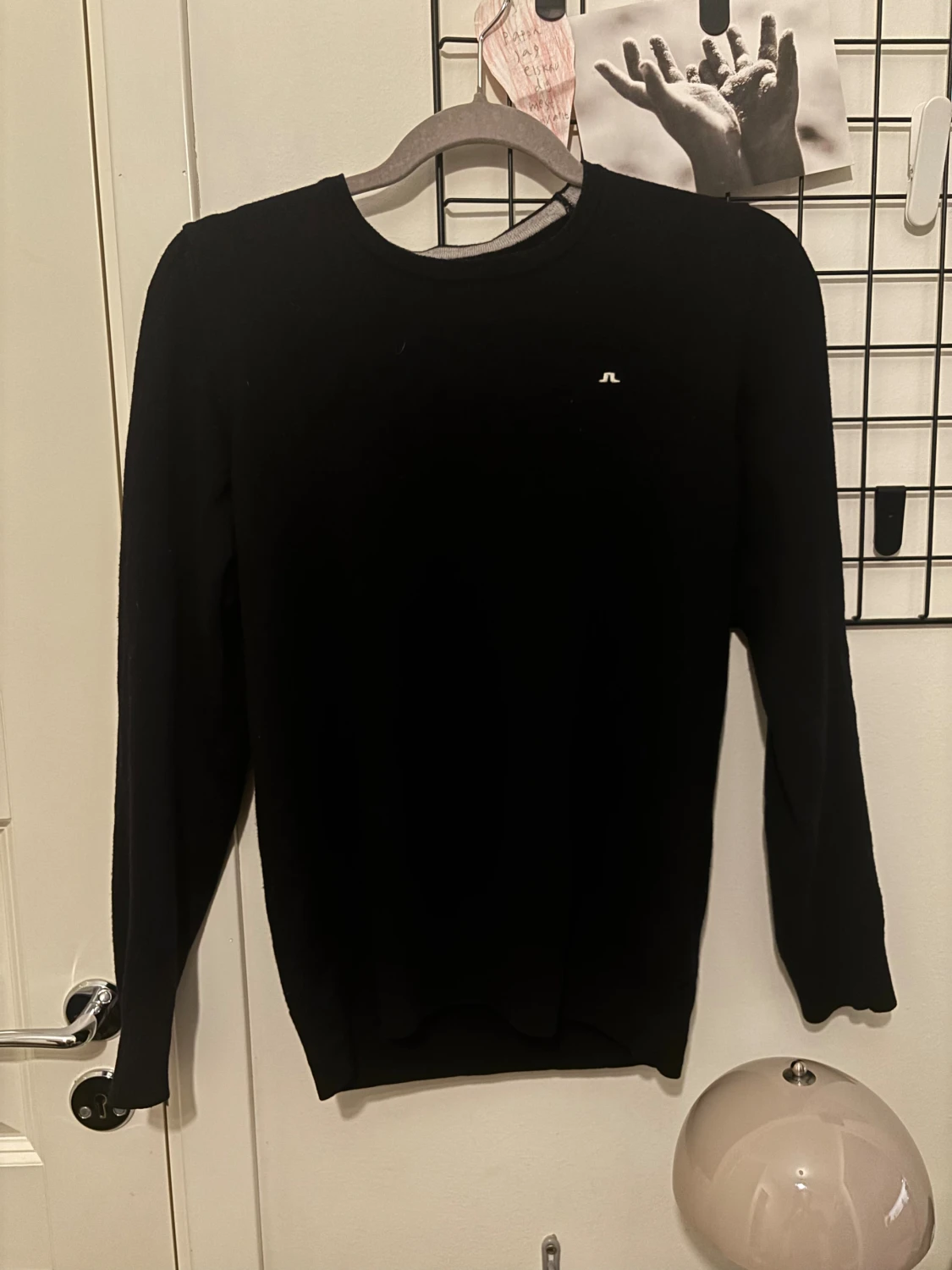 Svart stickad tröja från J.Lindeberg