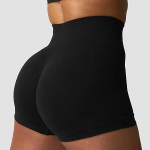 NY KOLLEKTION! ICIW / ICANIWILL - Säljer ett par svarta seamless shorts från ICANIWILL med hög midja och tight passform. De har en bred ribbad midjeresår och silikonprickar på insidan av bensluten för extra grepp. Perfekta för gymmet eller andra sportaktiviteter.