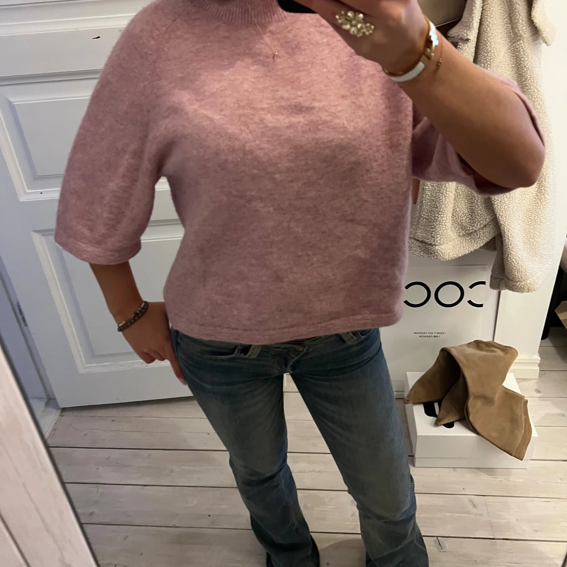 Trekvartsärmad stickad tröja