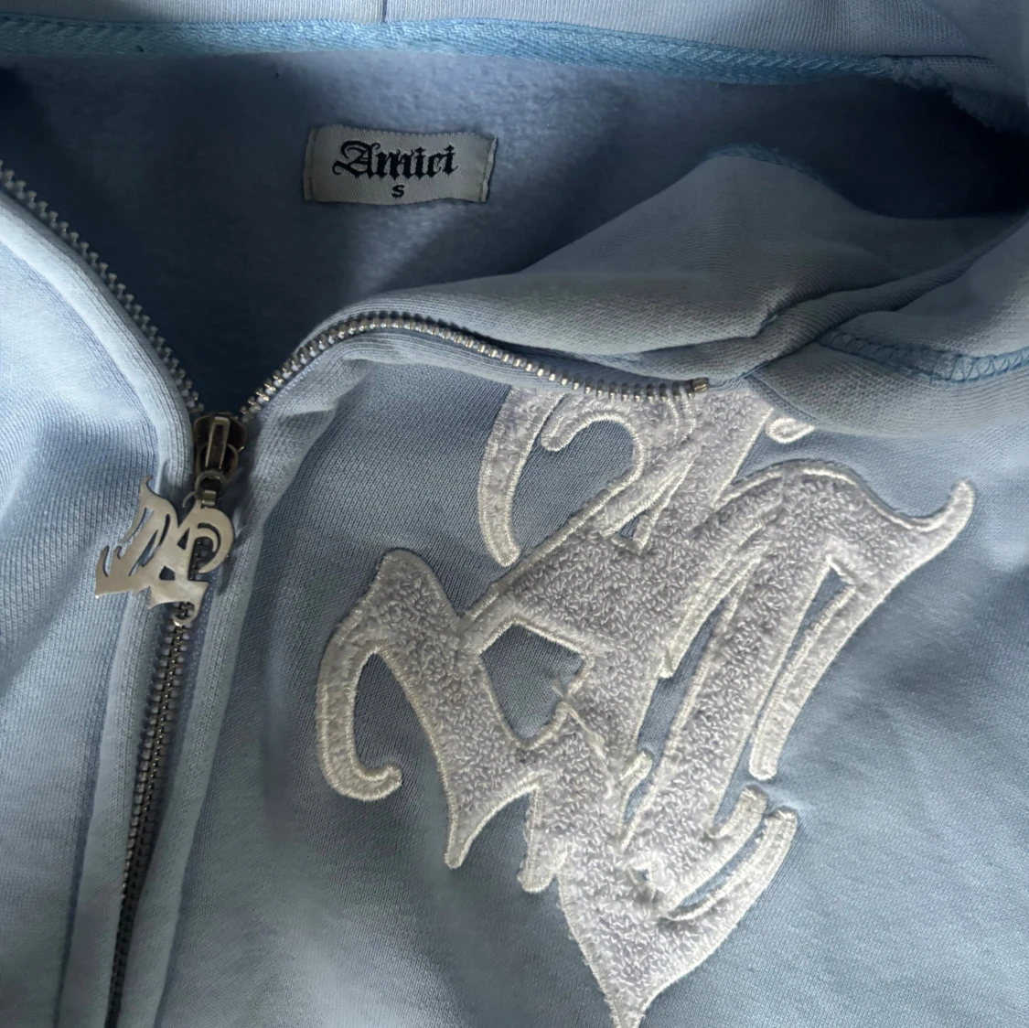 Ljusblå hoodie från AMICI Clothing  - 1