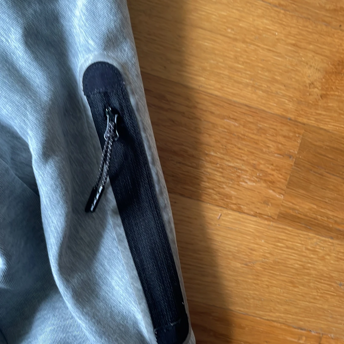 Grå Tracksiut med huva från Nike - 1